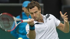 Ernests Gulbis v semifinále turnaje v Rotterdamu proti Tomái Berdychovi.