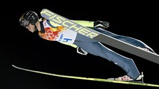 Český skokan Roman Koudelka v olympijskému závodu na velkém můstku. (15. února...