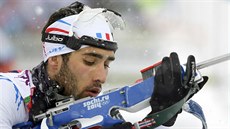 Francouzský biatlonista Martin Fourcade v olympijském závodu na 15 kilometr s...