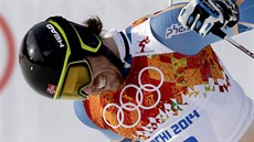 Norský lyžař Kjetil Jansrud slaví  v cíli olympijského superobřího slalomu.