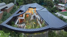 Investor si p�ál, aby se v dom� objevil i "madang", tradi�ní p�dorys korejských...