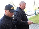 Policie se zadreným Ivo Rittigem. (21.3.2014)