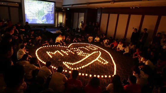 Píbuzní cestujících letu MH370 ekají v pekingském hotelu Lido na informace, co se stalo s letadlem, které zmizelo v noci na 8. bezna.