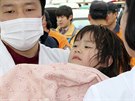 Korejské dítě zachráněné z trajektu Sewol (16. dubna 2014)