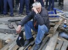 Obyvatelé Odsy truchlí za desítky mrtvých, kteí uhoeli v budov místních...