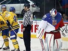 P�ekonaný �eský branká� Alexander Salák a �védské oslavy.