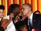 Michelle Obamová a její manel Barack Obama (2014)