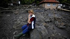 Následky povodní v bosenské vesnici Top�i� Polje (20. kv�tna 2014)