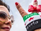 lenka syrské opozice v Belgii protestuje proti prezidentským volbám v Sýrii...