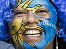 A fan from Uruguay waits for the start of the group D World Cup soccer match...