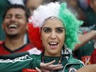 A Mexican fan sings her country's national anthem before the group A World Cup...