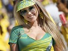 A Brazilian fan attends the opening ceremony of the 2014 World Cup at the...