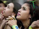 Fans watch a live telecast of the Mexico vs. Brazil match at the FIFA Fan Fest...