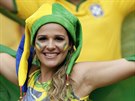 A Brazilian fan poses with her national flag before the group A World Cup...