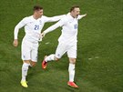 VYROVNÁNO. Anglian Wayne Rooney (vpravo) se raduje z gólu na 1:1.