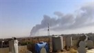 Podle agentury Reuters tyto z�b�ry zachycuj� ho��c� rafin�rii v ir�ck�m m�st�...