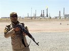Kurdské milice stráí rafinerii v Mosulu ped vzbouenci z ISIL (22. ervna...