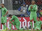 ZKLAMÁNÍ Alírtí fotbalisté poté, co v osmifinále mistrovství svta proti...