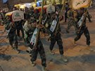 Poheb padlých len íitských milicí v Nadáfu (7. ervence 2014)