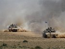 Izraelské tanky se stahují z Gazy (3. ervence 2014).