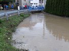 Rozvodnný Troubský potok v nedli v Popvkách.