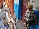 Raisa Jelisjevová v troskách domu v Mikolajevce nedaleko Slavjansku, který...