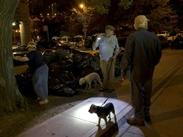 Richard Reynolds, (2nd R) and other members of the Ryders Alley Trencher-fed...