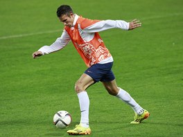 M HO POSLOUCH. Robin van Persie na trninku nizozemsk reprezentace v Praze. 