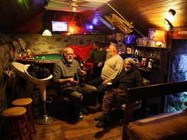 Locals and tourists gather in The Whales Head community pub on the Isle of...