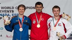 Tomá� T�han (vpravo) na stupních vít�z�.