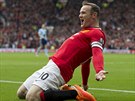 JE TAM. Wayne Rooney, útoník Manchesteru Untied, se raduje ze vsteleného gólu.