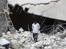 Následky leteckých úder u syrského msta Idlib (24. záí 2014)