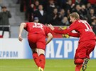 Kyriakos Papadopoulos (druhý zprava) z Leverkusenu slaví gól v zápase s...
