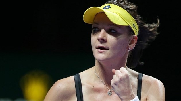 Polsk tenistka Agnieszka Radwask se raduje z vtzstv na Turnaji mistry nad Kvitovou.