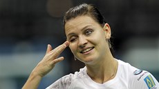 ČÍNSKÝ ÚSMĚV. Lucie Šafářová na tréninku českého týmu před finále Fed Cupu.