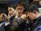 Píbuzní obtí z potopeného trajektu Sewol na zasedání korejského parlamentu 7....