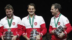 ŠTĚSTÍ. Se odráží ve tvářích Stana Wawrinky, Rogera Federera a kapitána...