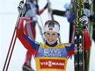 Marit Björgenová se raduje a usmívá, v po vítzství v minitour v Lillehammeru.