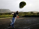 A competitor throws during the UK Christmas Tree Throwing Championships in...