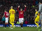 DÍKY ZA VAE OVACE. Útoník Manchesteru United Wayne Rooney (uprosted) slaví...