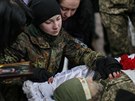 Kyjev. Poheb bojovníka dobrovolnického praporu Azov, který zahynul na východ...
