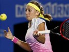 Petra Kvitova of the Czech Republic hits a return against Madison Keys of the...