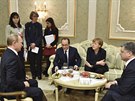 Vladimir Putin, François Hollande, Angela Merkelová a Petro Poroenko na krátké...