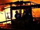 Hasiči Olomouckého kraje ve středu v noci likvidovali požár konírny v...