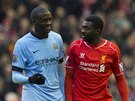 Kolo Touré (vpravo) z Liverpoolu a jeho bratr Yaya Touré z Manchesteru City po...