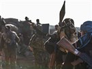Pešmergové v Ras al-Ajn bojují proti islamistům (10. března 2015).
