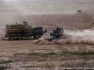Irátí vojáci se pipravují na útok na Tikrít (12. bezna 2015).