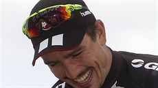 Nmecký cyklista John Degenkolb - astný a usmvavý vítz slavného závodu...