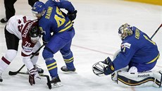 �védský branká� Jhonas Enroth likviduje za asistence Daniela Rahimiho úto�nou...