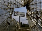The sign of a plastic tube factory that closed in 2011 is seen near the town...